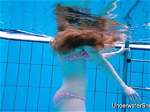 marvelous doll flashes sumptuous figure underwater