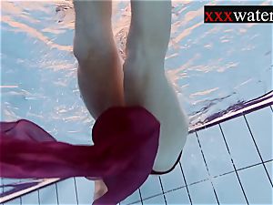 Smoking sizzling Russian red-haired in the pool